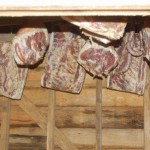 Cured hams in the smokehouse