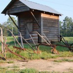 Farm Smoke House and plows