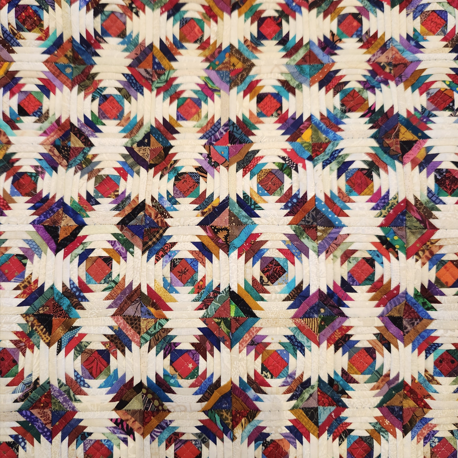 Details of a square quilt patteren